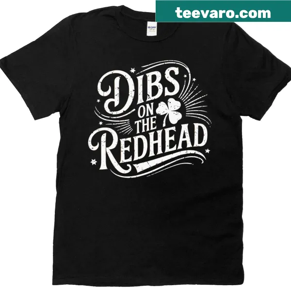 Funny St. Patrick's Day t-shirt featuring shamrocks and 'Dibs On The Redhead' text