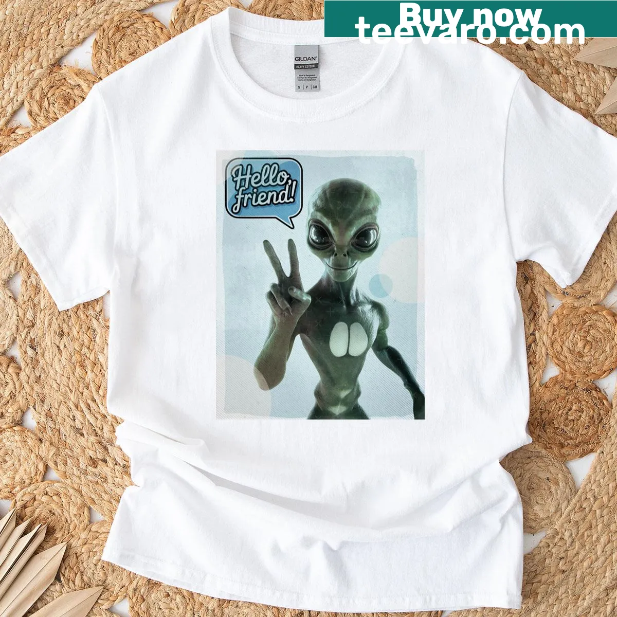 Playful alien graphic T-shirt with friendly design — on a men's t-shirt