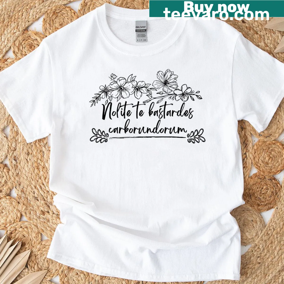 T-shirt with the phrase 'Nolite Te Bastardes Carborundorum' and a rose graphic — on a men's t-shirt