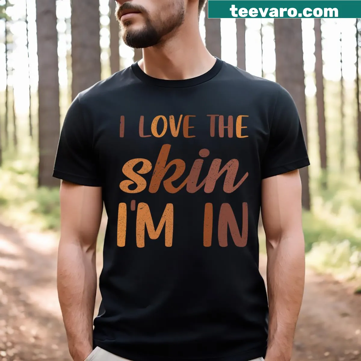 T-shirt featuring 'Love the Skin I'm In' text with African pride theme.