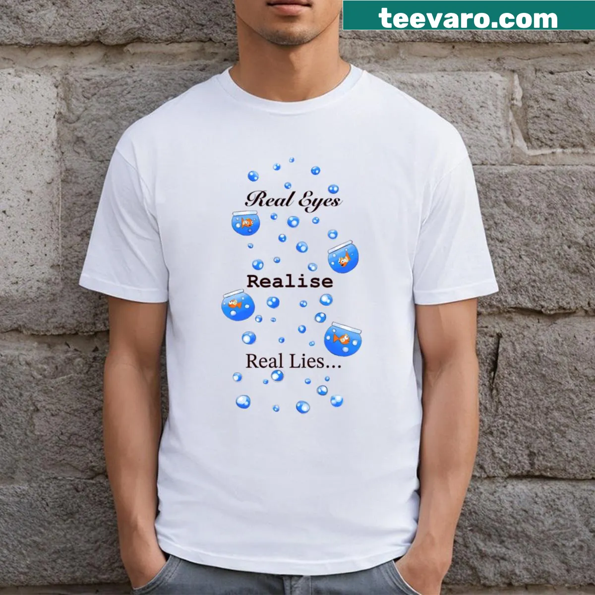 T-shirt displaying the phrase 'Real Eyes Realise Real Lies' in bold typography