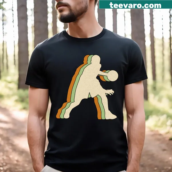 Vintage graphic of a basketball player dribbling on a T-shirt