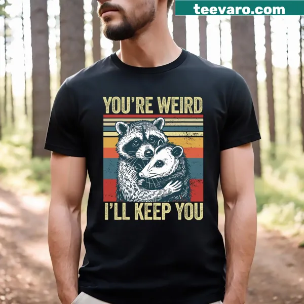 Whimsical t-shirt with raccoon and possum graphics and funny saying