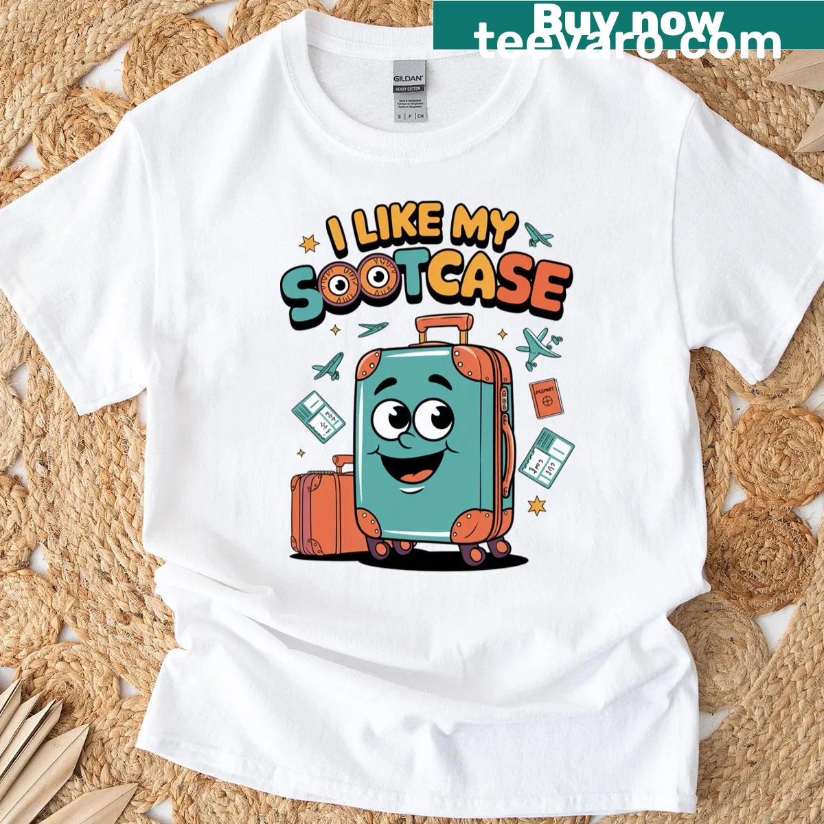 Funny travel-themed T-shirt with cartoon suitcase graphic and text. — on a men's t-shirt