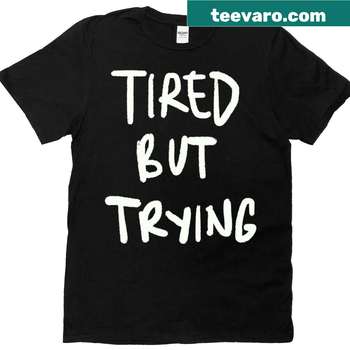 Motivational T-shirt with 'Tired But Trying' phrase — on a men's t-shirt