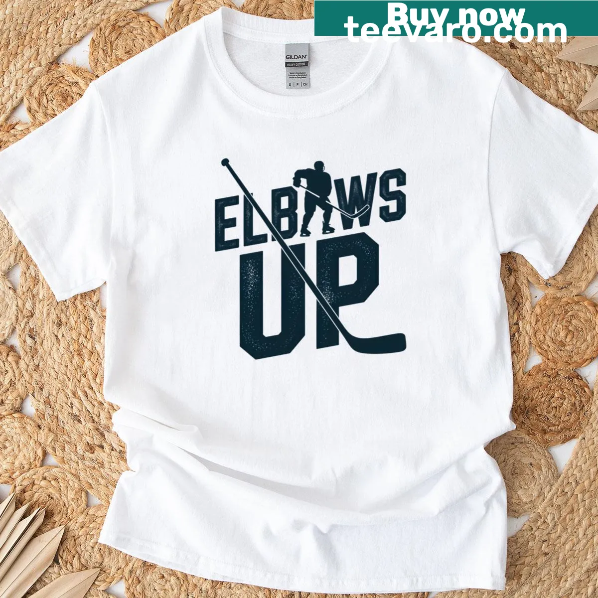 Vintage-style hockey t-shirt with phrase 'Hustle Elbows Up' — on a men's t-shirt