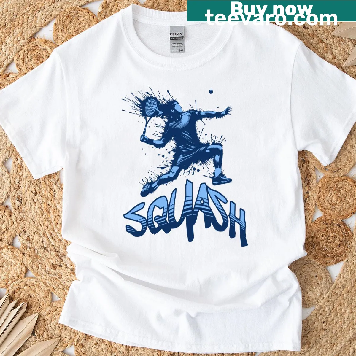 Artistic squash player t-shirt featuring a paint splash design — on a men's t-shirt