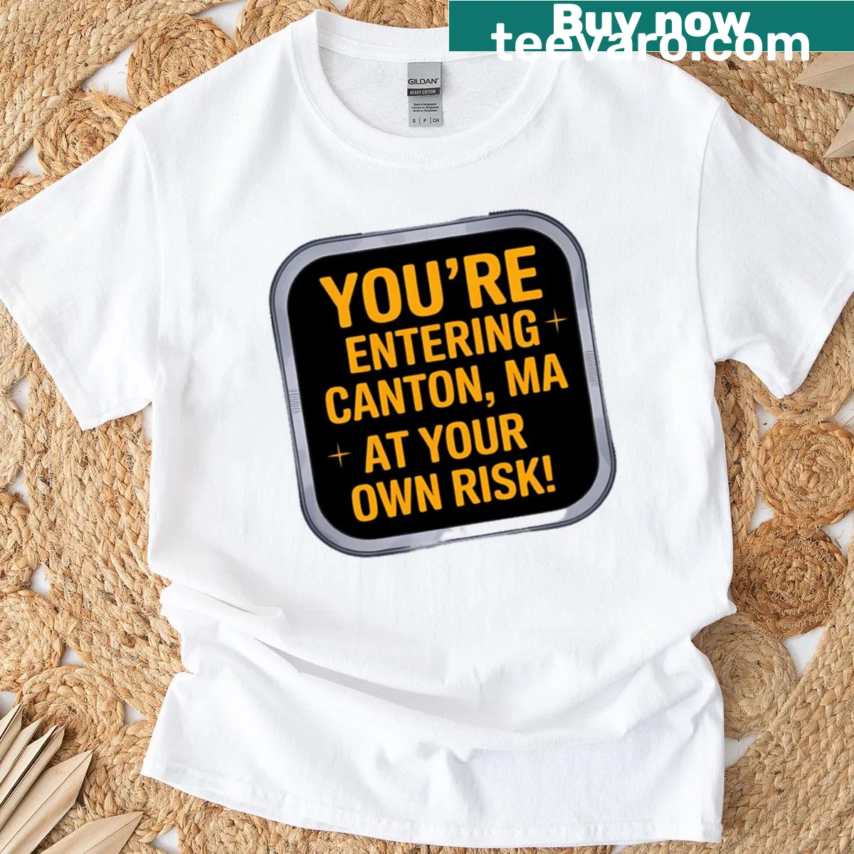 Canton, MA warning T-shirt with bold text saying 'You're Entering Canton Ma At Your Own Risk!' — on a men's t-shirt