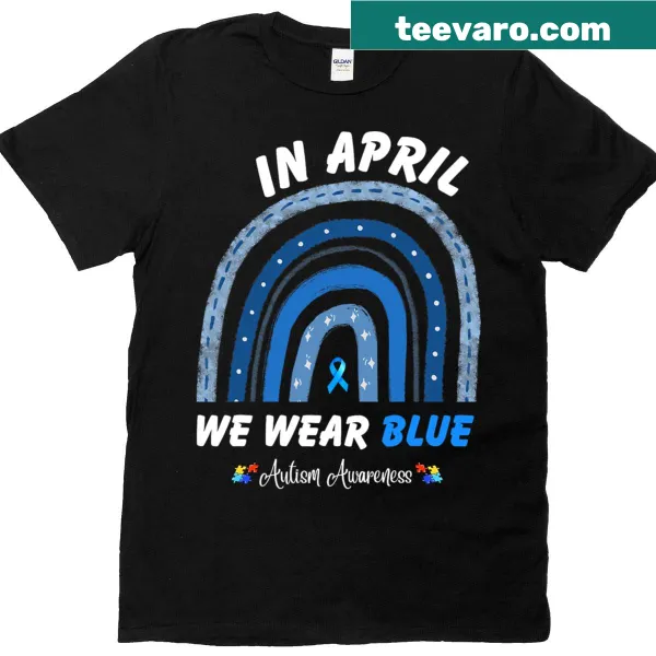 Rainbow-themed t-shirt saying 'In April We Wear Blue' for autism awareness.
