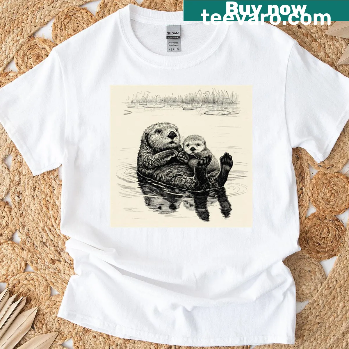 Cute otter mother and pup graphic on T-shirt for animal lovers. — on a men's t-shirt