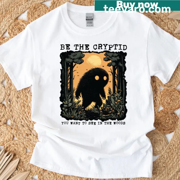 Typographic T-shirt with the phrase 'Be The Cryptid'
