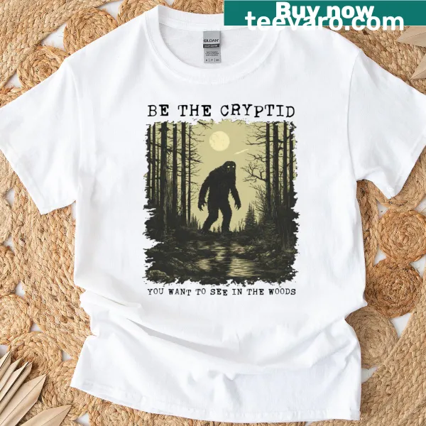 Whimsical t-shirt encouraging wearers to embody a cryptid in the woods.