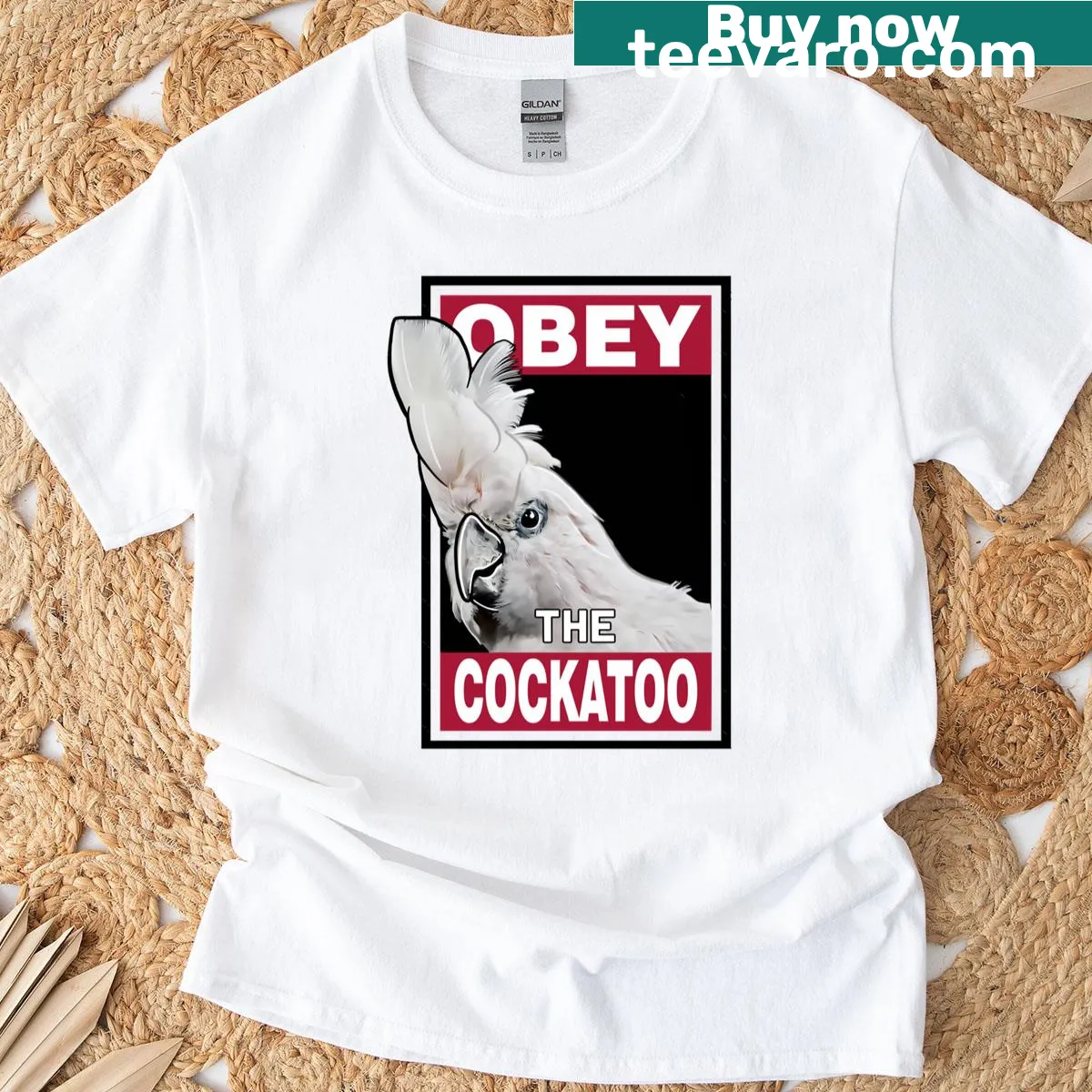 T-shirt featuring an illustration of a red-vented cockatoo — on a men's t-shirt