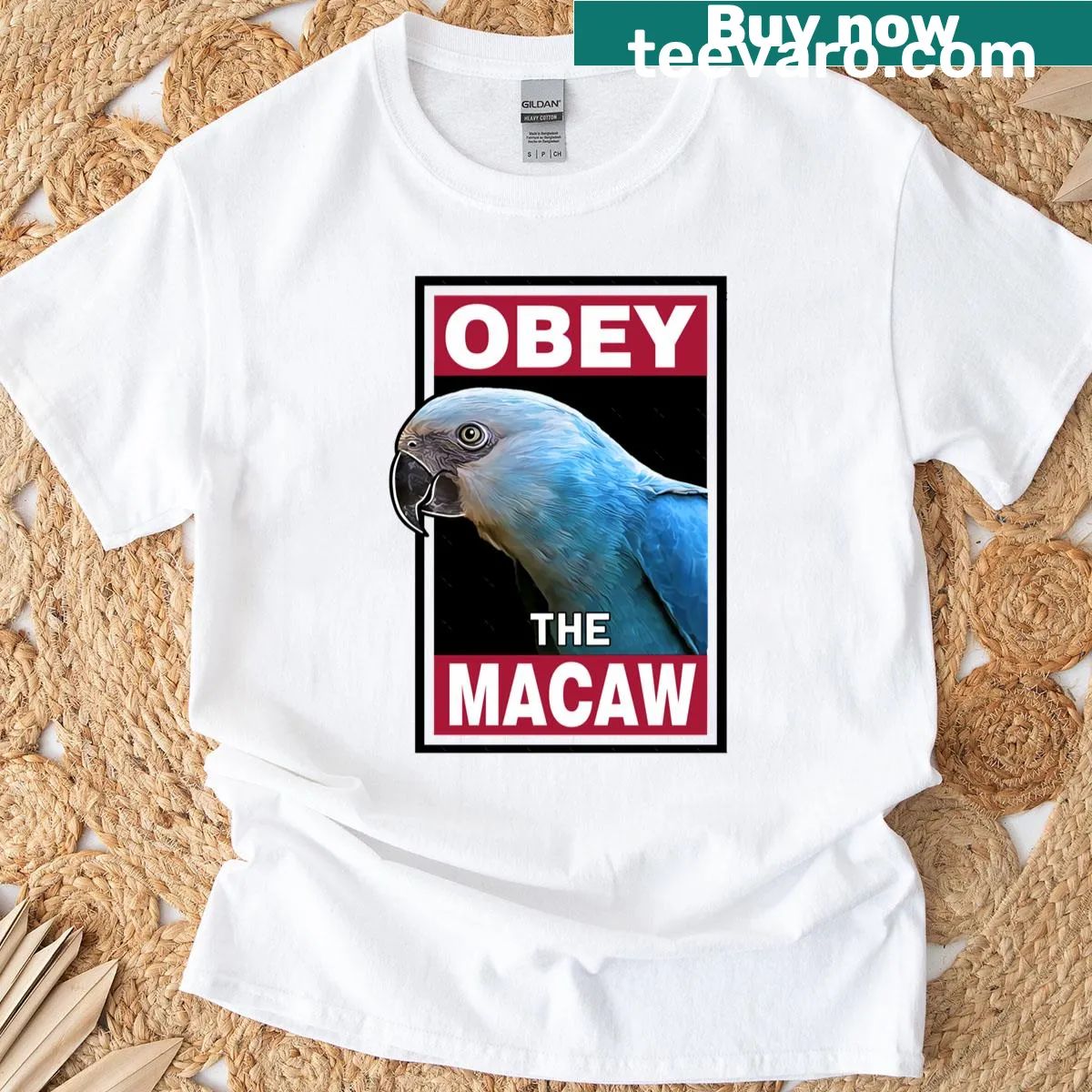 T-shirt featuring the message 'Obey The Spix's Macaw' with a macaw graphic. — on a men's t-shirt