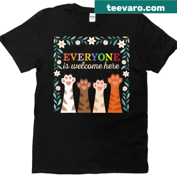 Hand-lettered 'Everyone Is Welcome Here' graphic with floral design on a T-shirt