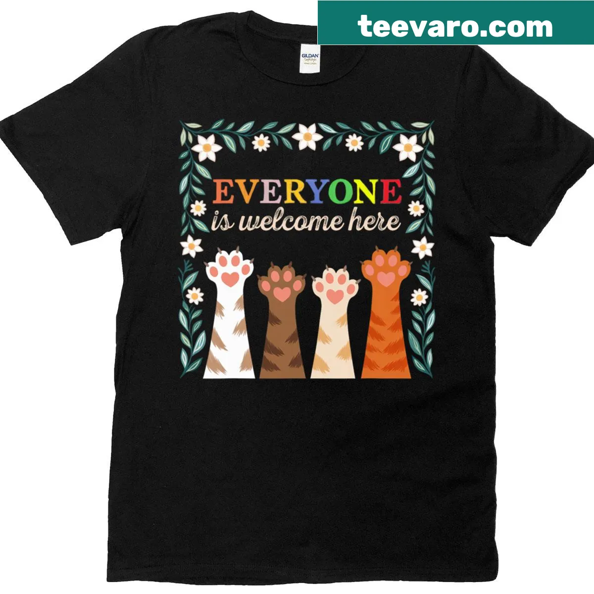 Hand-lettered 'Everyone Is Welcome Here' graphic with floral design on a T-shirt — on a men's t-shirt