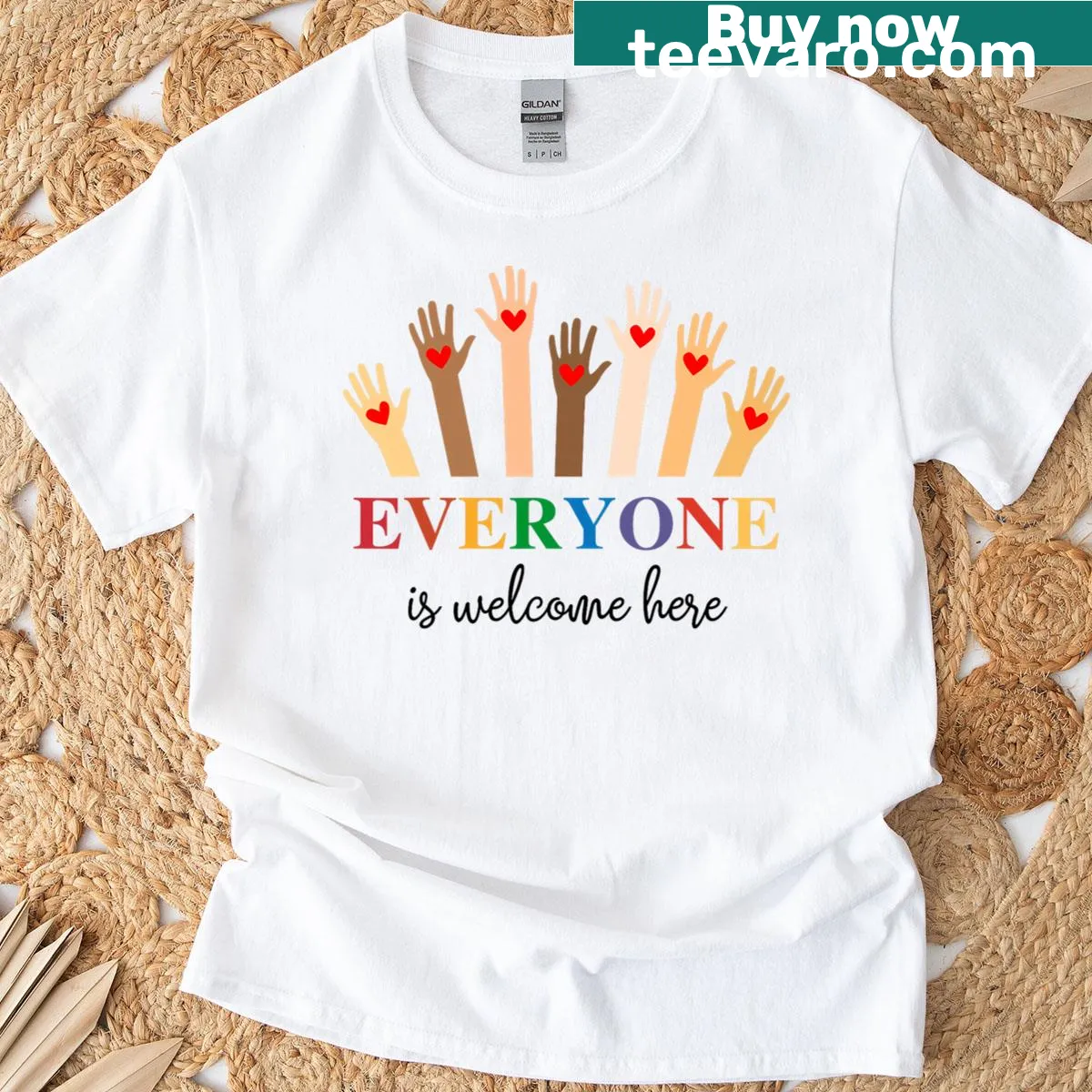 Inclusive teacher T-shirt featuring a fist graphic and welcoming text — on a men's t-shirt