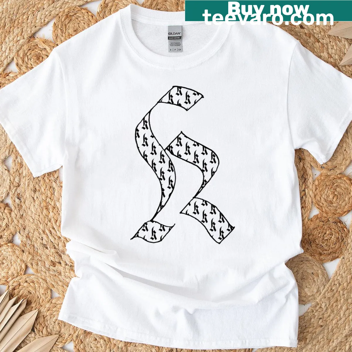 Stylish calligraphy 'K' design on an elegant t-shirt — on a men's t-shirt
