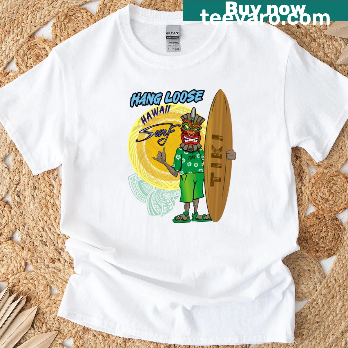 Vintage surfboard T-shirt with Tiki design reflecting Hawaiian surf culture. — on a men's t-shirt
