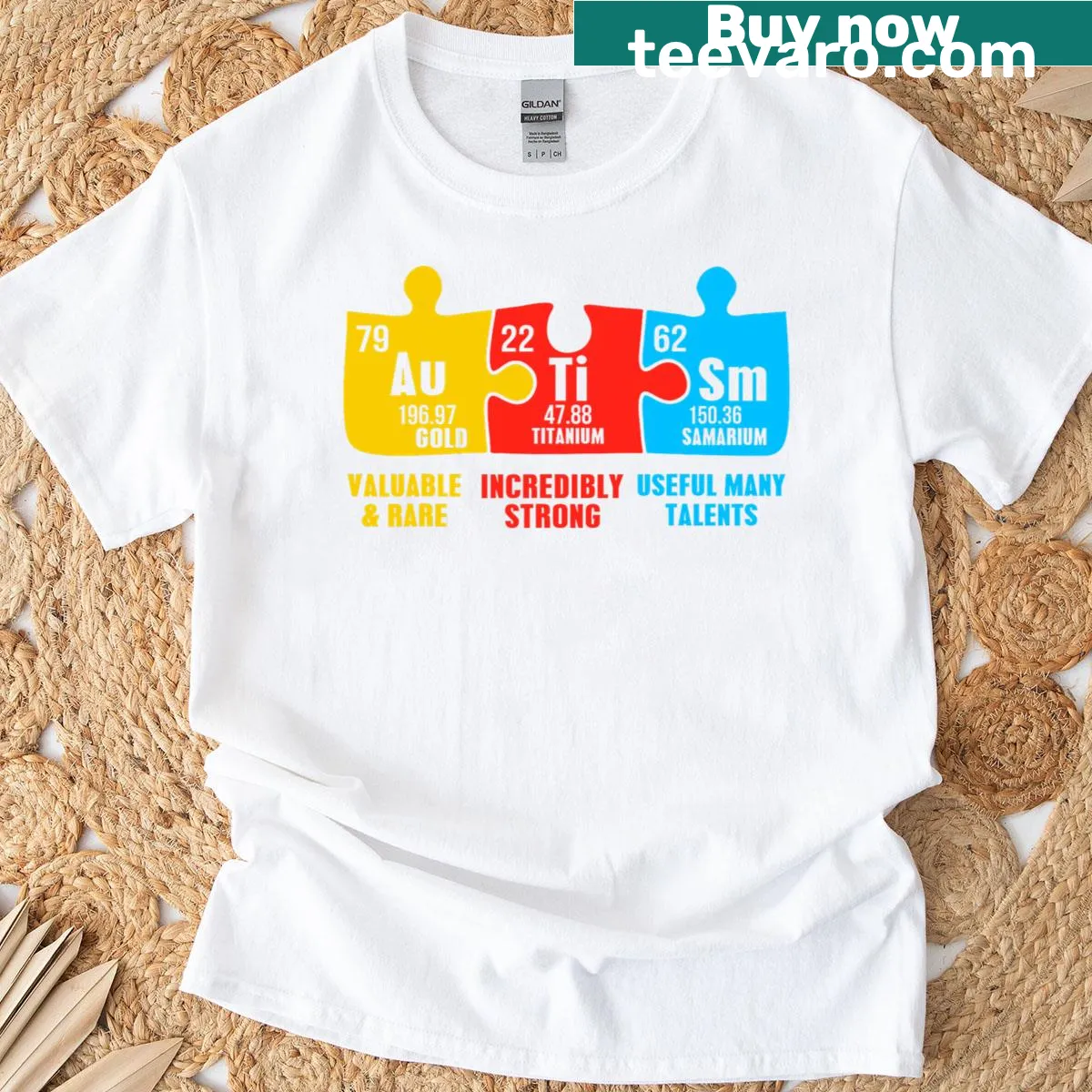 Periodic table design highlighting autism elements for awareness — on a men's t-shirt