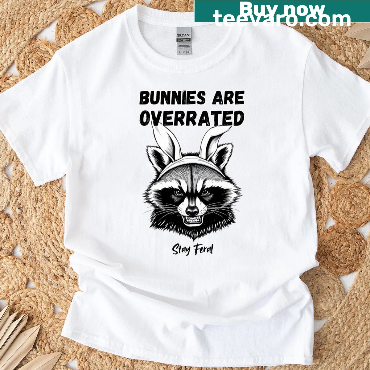 Sarcastic typography t-shirt with the saying 'Bunnies Are Overrated Stay Feral' — on a men's t-shirt