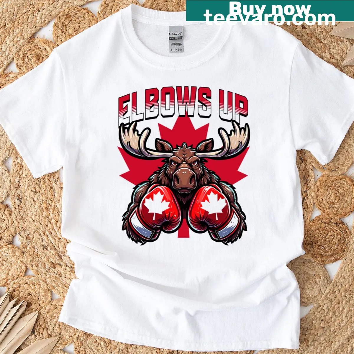 Essential Elbows Up Canadian Elbows t-shirt with playful text — on a men's t-shirt