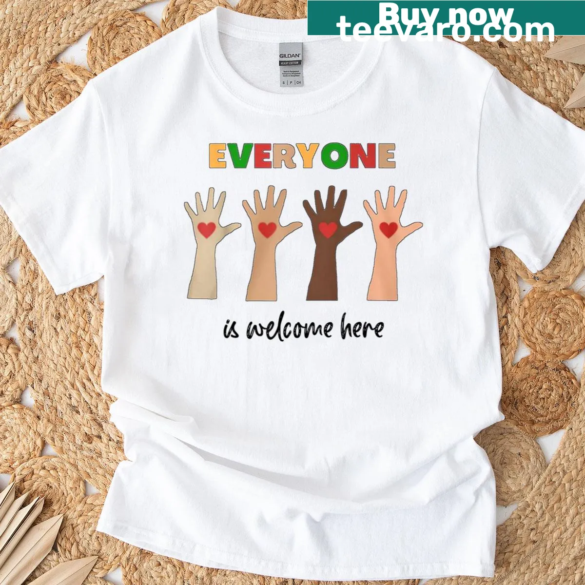 Teacher t-shirt with fist symbol and supportive message — on a men's t-shirt