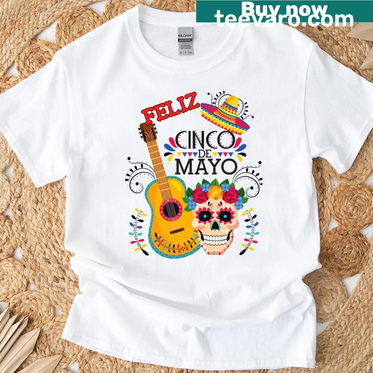 Cinco de Mayo T-shirt featuring a guitar-playing skull design. — on a men's t-shirt