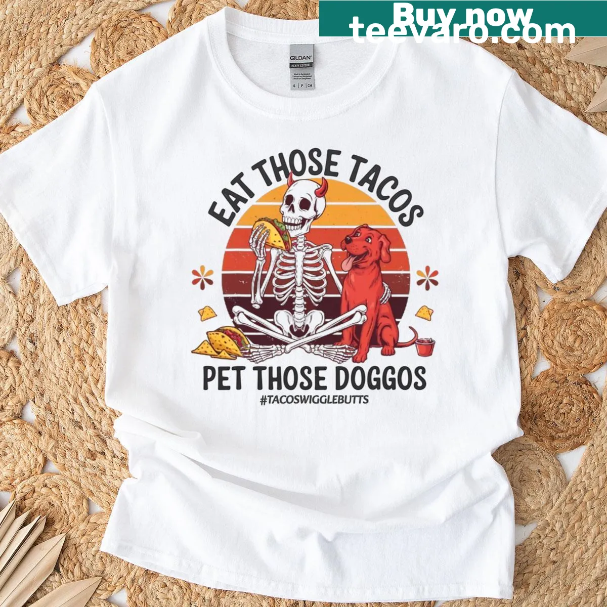 Funny T-shirt featuring a skull and the phrase 'Tacos Eat Those Doggos' — on a men's t-shirt