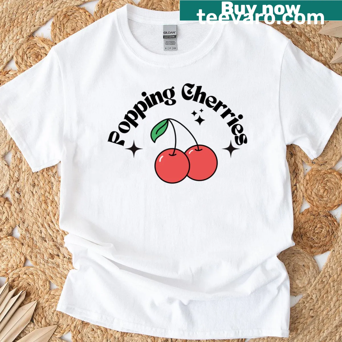 Whimsical design of popping cherries — on a men's t-shirt