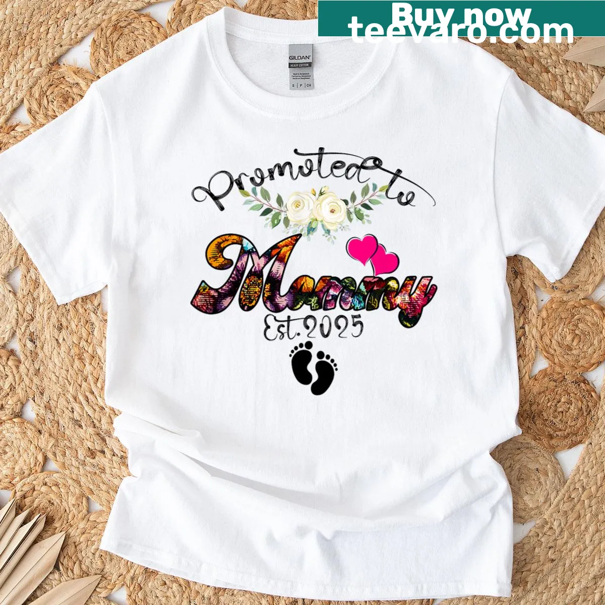 Floral-themed t-shirt announcing promotion to mom in 2025 — on a men's t-shirt