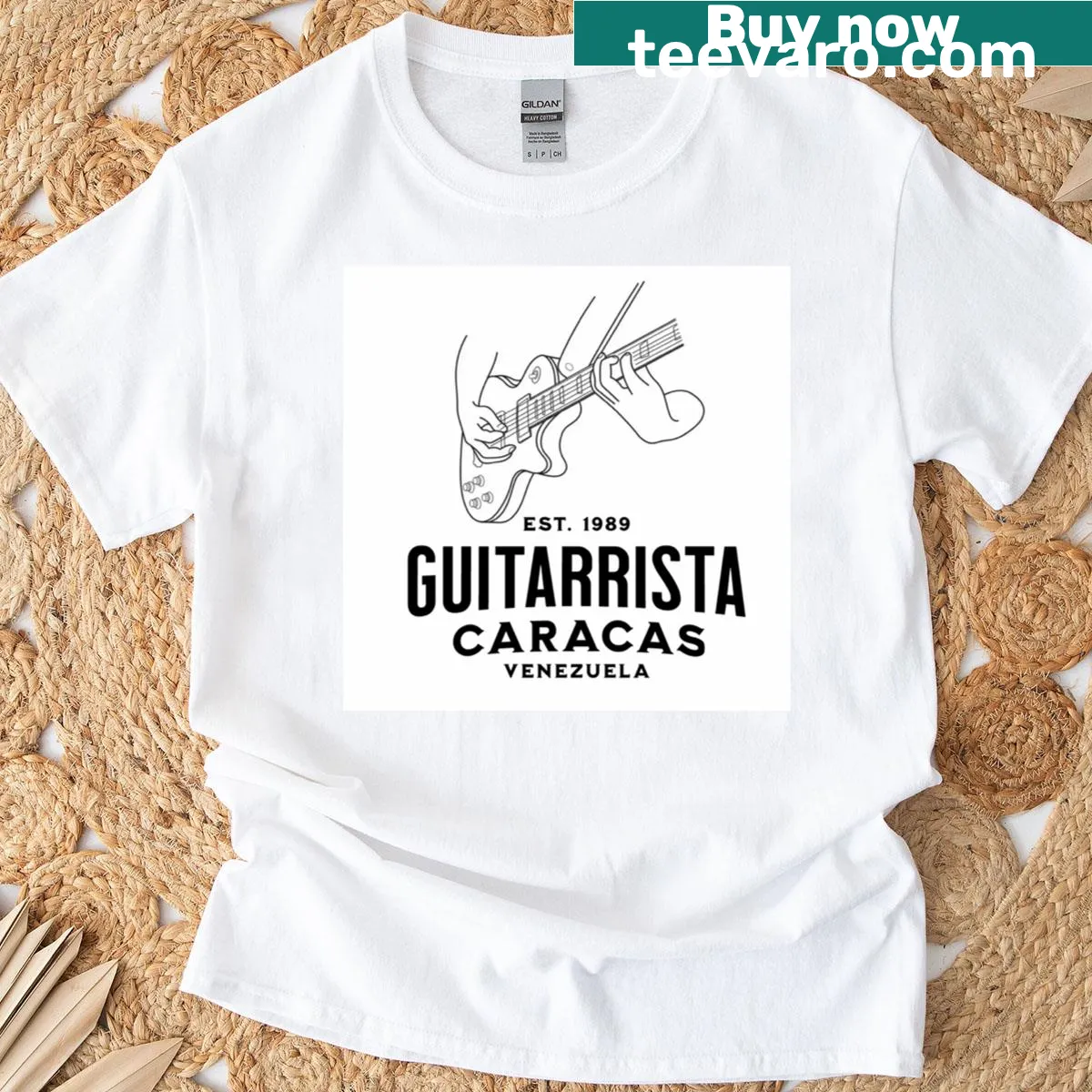 T-shirt featuring an illustration of a guitarist from Caracas — on a men's t-shirt