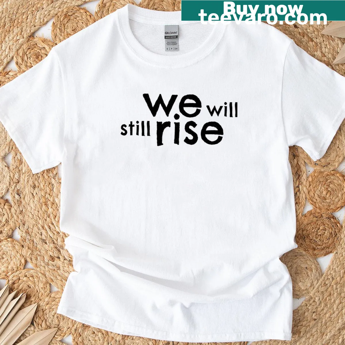 Inspirational T-shirt with the phrase 'Will We Rise Still' in bold text — on a men's t-shirt