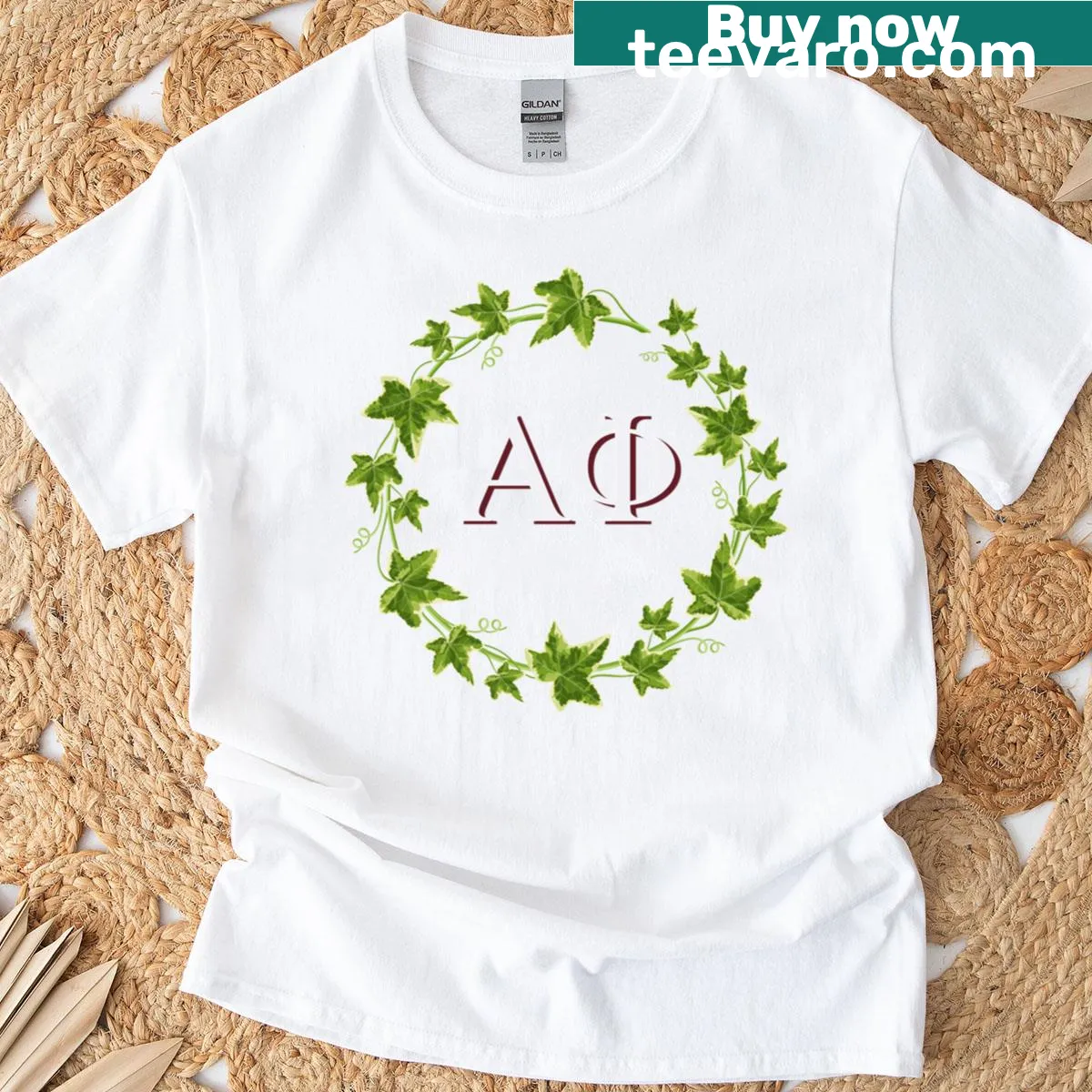 Vintage T-shirt with Greek letters and ivy wreath design for sorority — on a men's t-shirt