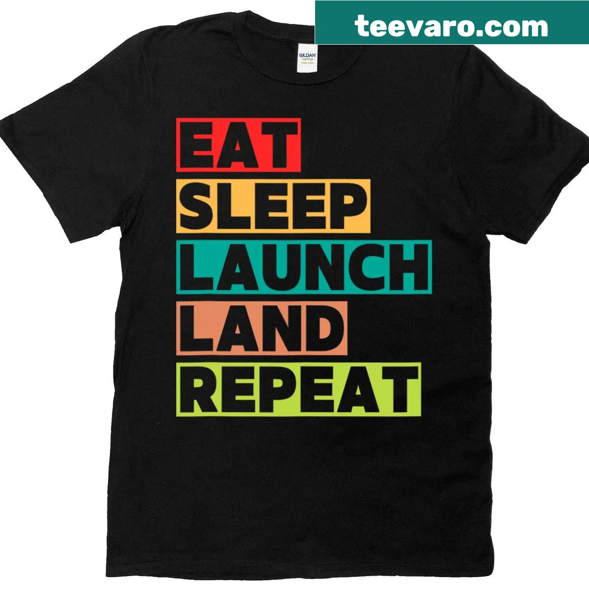 Humorous t-shirt for physics teachers featuring 'Launch Sleep Eat Land Repeat.' — on a men's t-shirt