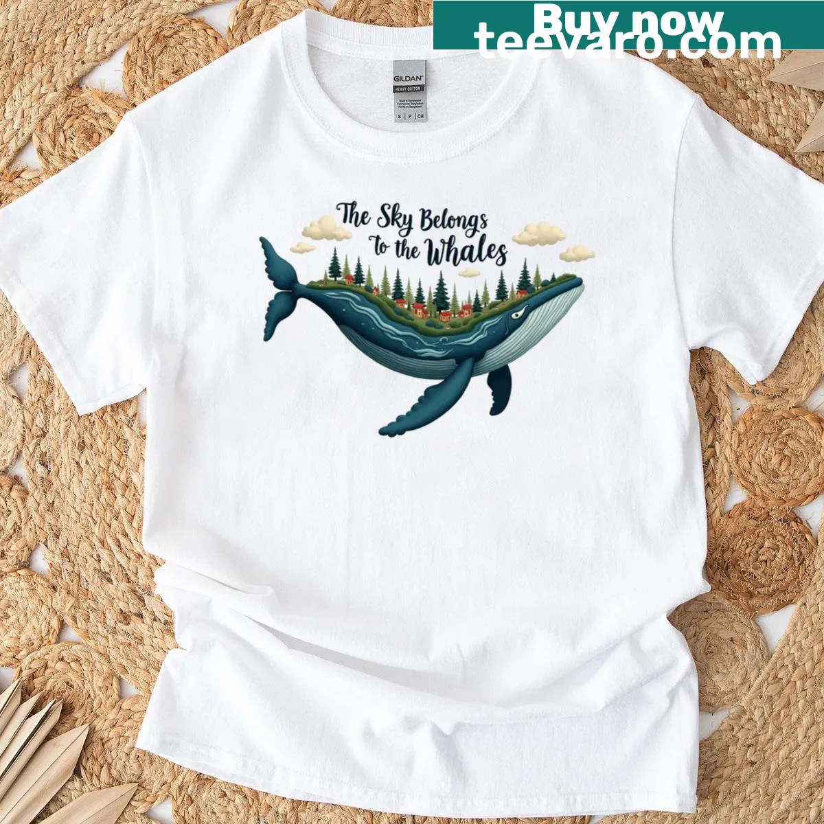 Illustration of a whale against a sky backdrop, celebrating nature — on a men's t-shirt
