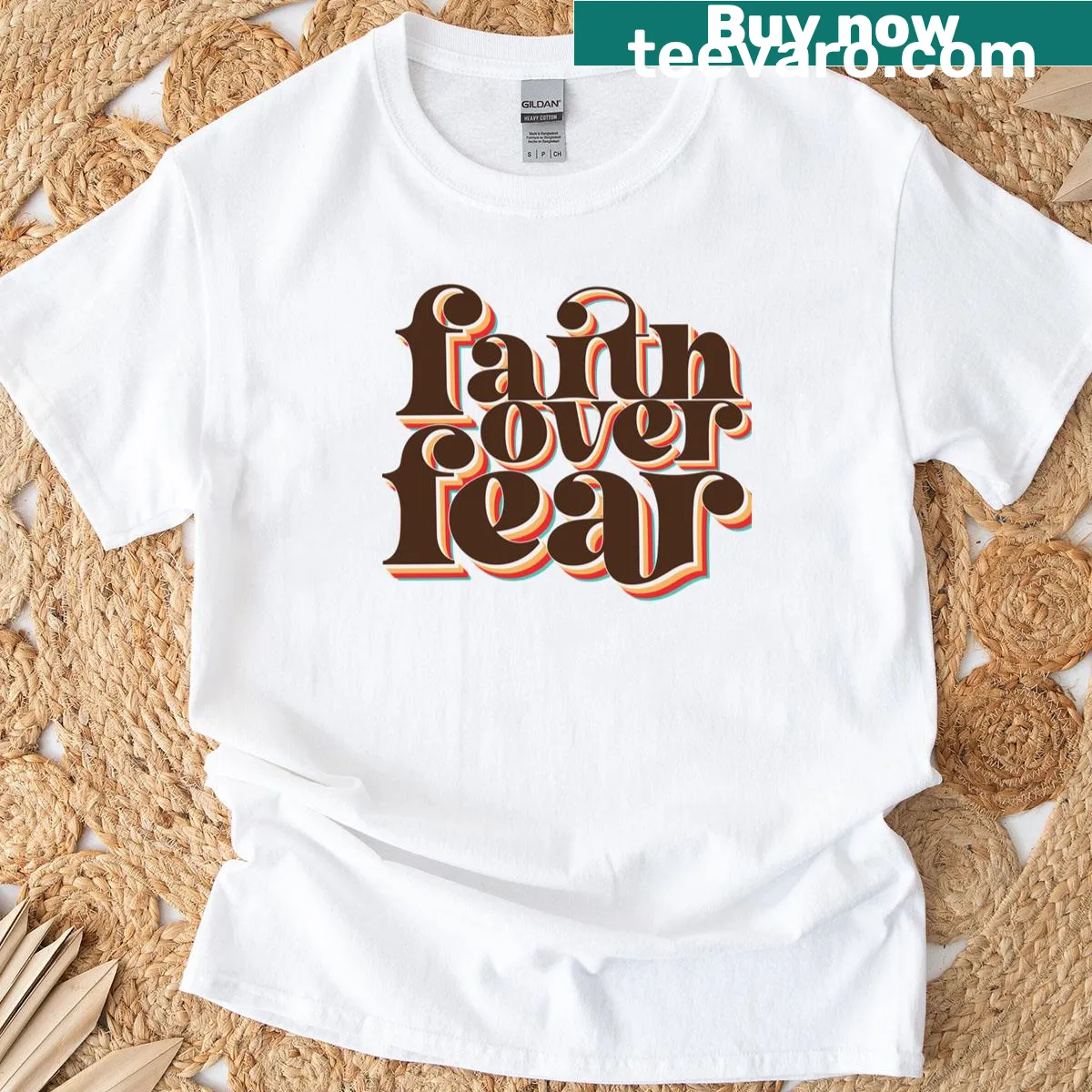 Retro t-shirt featuring the inspirational phrase 'Faith Over Fear' — on a men's t-shirt