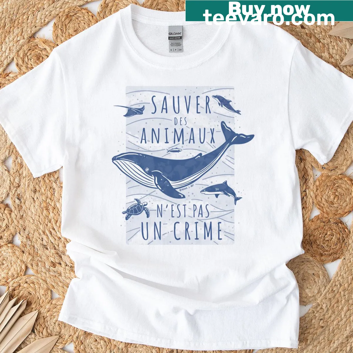 French t-shirt with 'Saving Animals Is Not A Crime' graphic — on a men's t-shirt