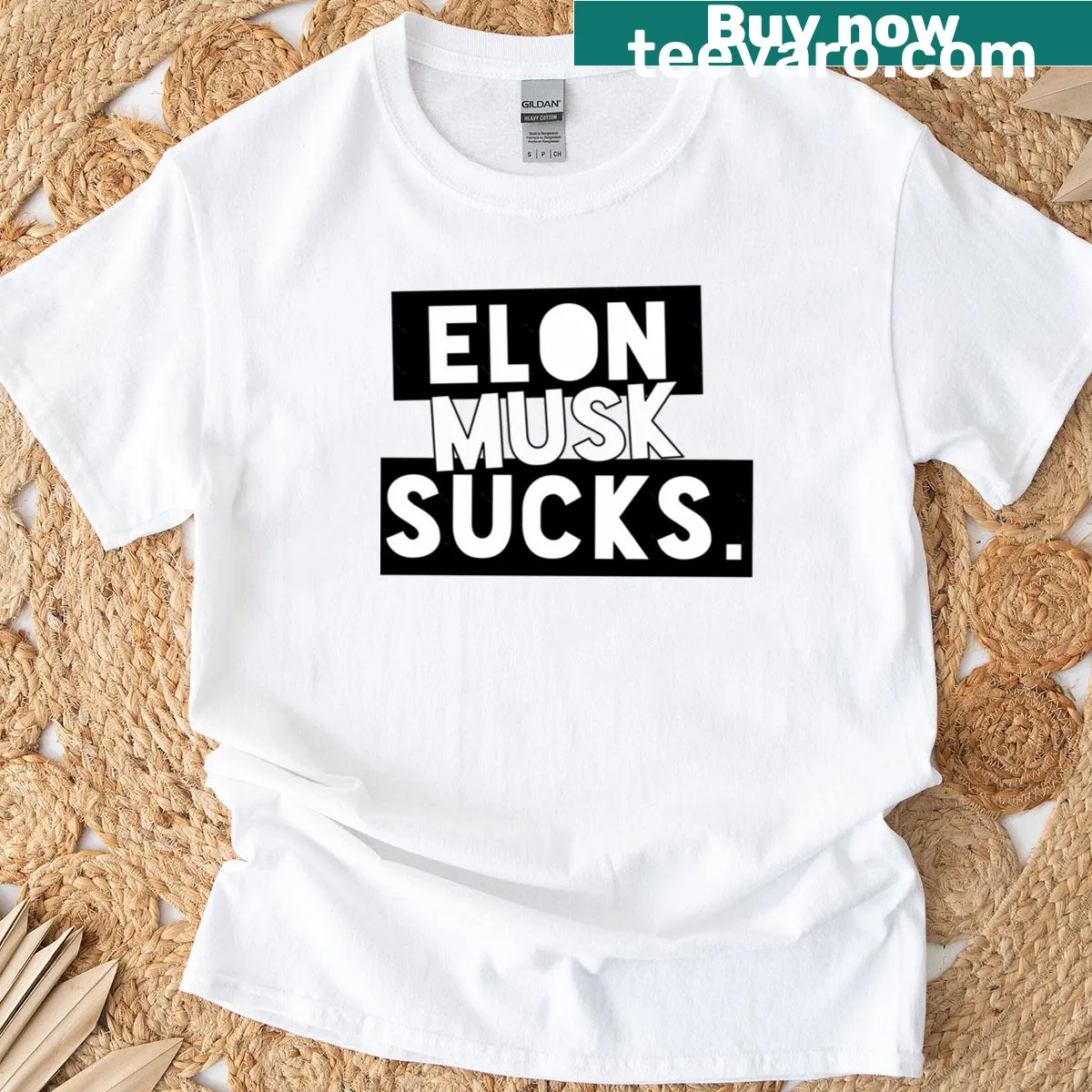 Bold text shirt that humorously states 'Elon Musk Sucks' — on a men's t-shirt
