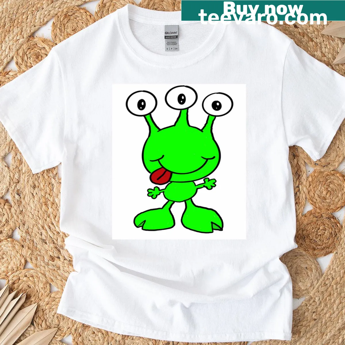 Playful alien graphic floating among stars on a classic t-shirt — on a men's t-shirt
