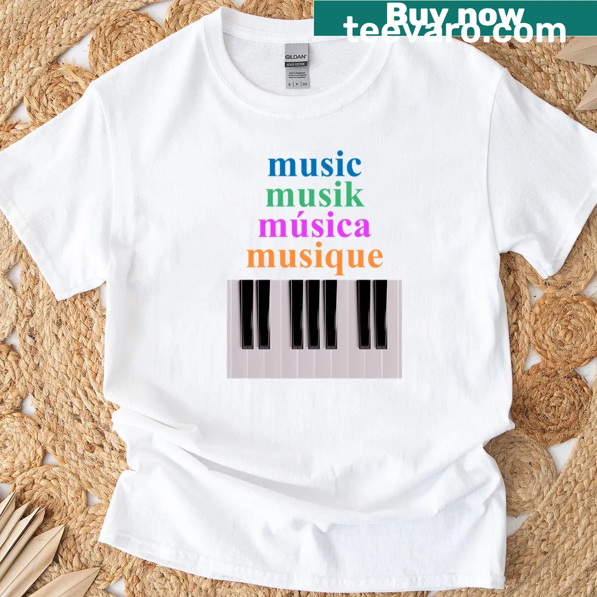Piano keyboard graphic with music text in multiple languages — on a men's t-shirt
