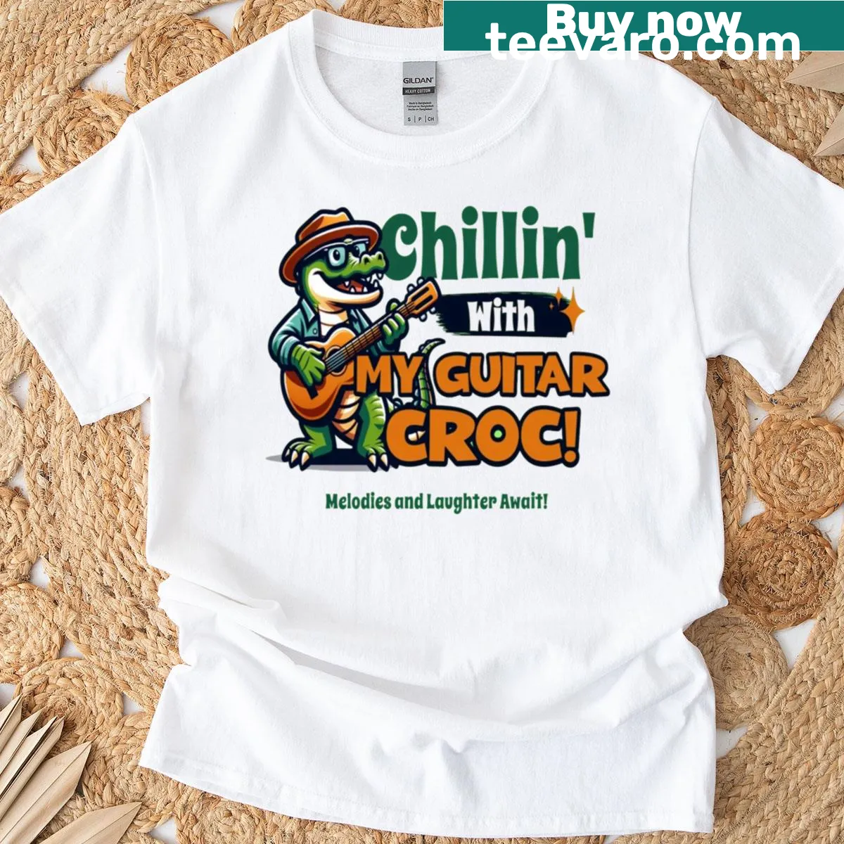 Crocodile playing guitar graphic on T-shirt — on a men's t-shirt