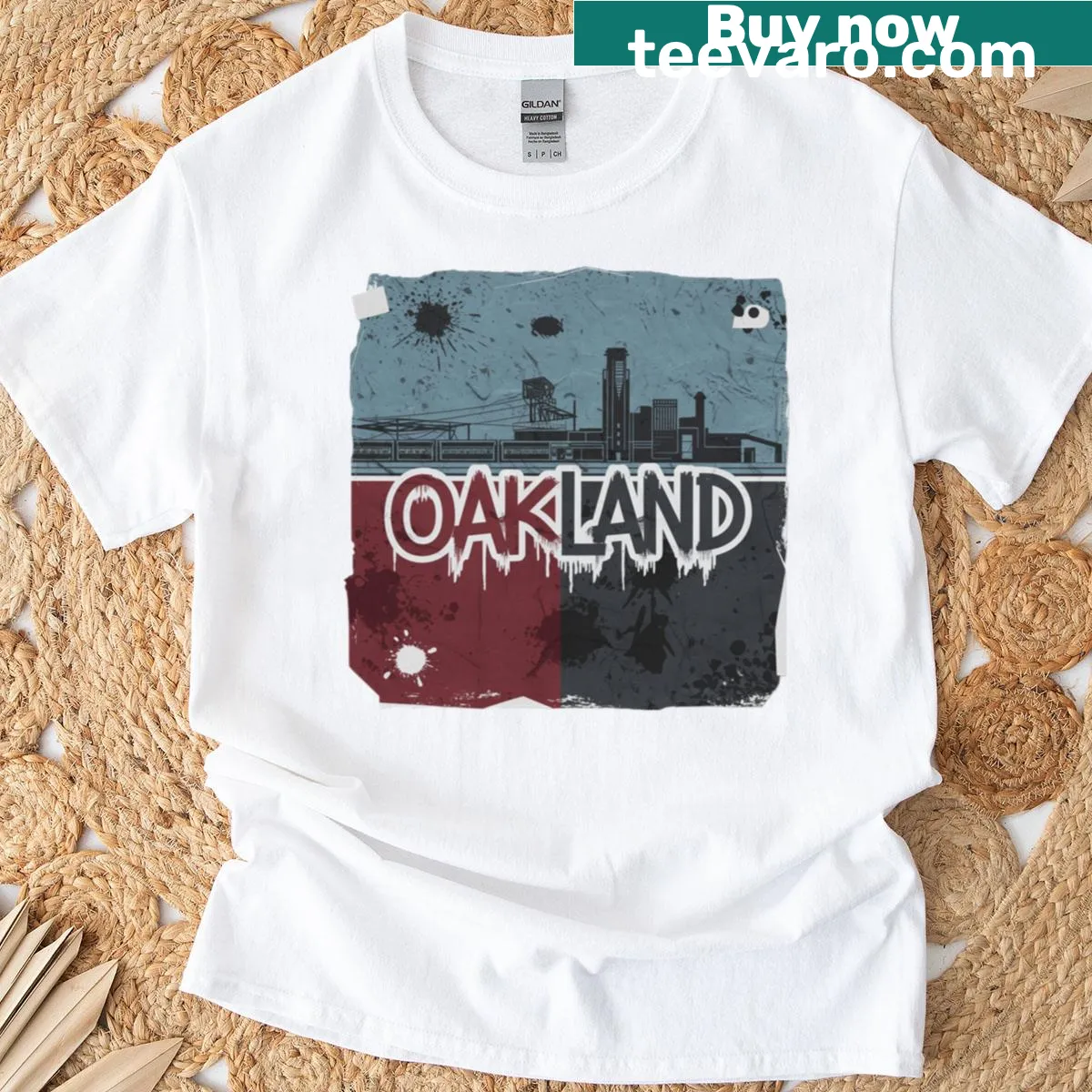 Illustrative design featuring music and sports symbols celebrating Oakland culture — on a men's t-shirt