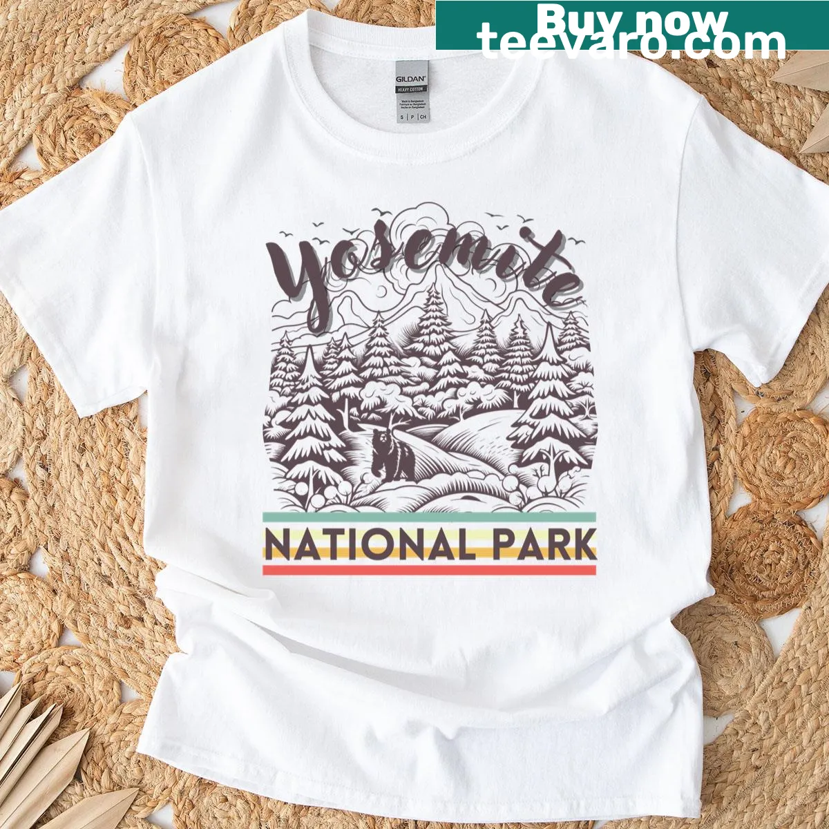 Vintage-style Yosemite National Park t-shirt with rainbow sticker graphic — on a men's t-shirt