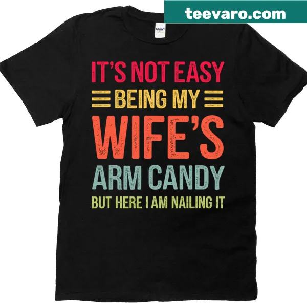 Graphic tee with humorous text about being arm candy for a wife