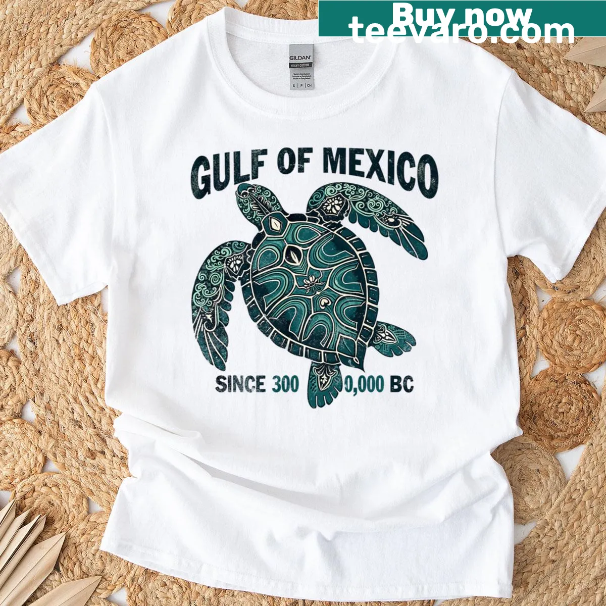 Tribal sea turtle design t-shirt highlighting its significance since 3000 BC. — on a men's t-shirt