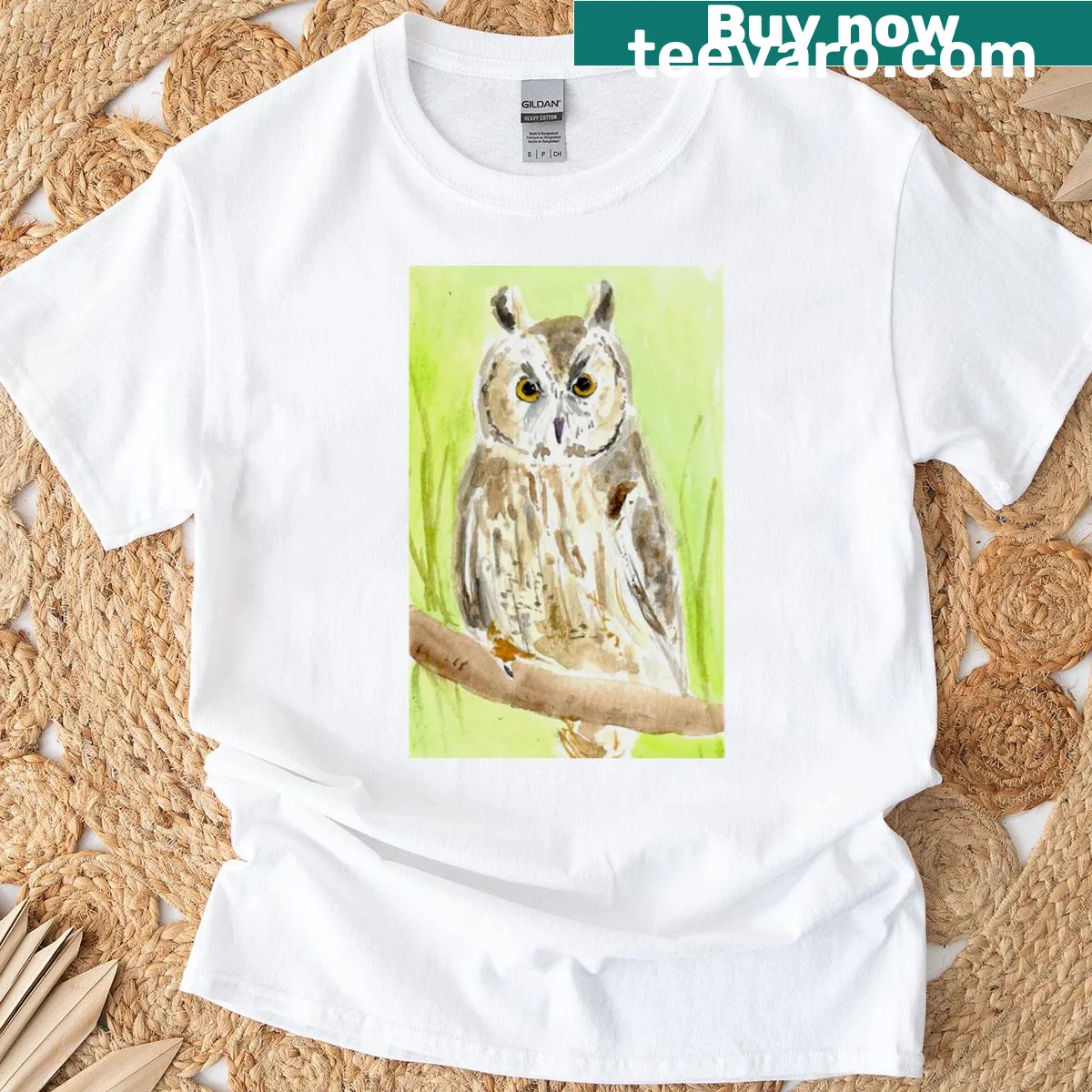 Illustrated t-shirt featuring a long eared owl — on a men's t-shirt