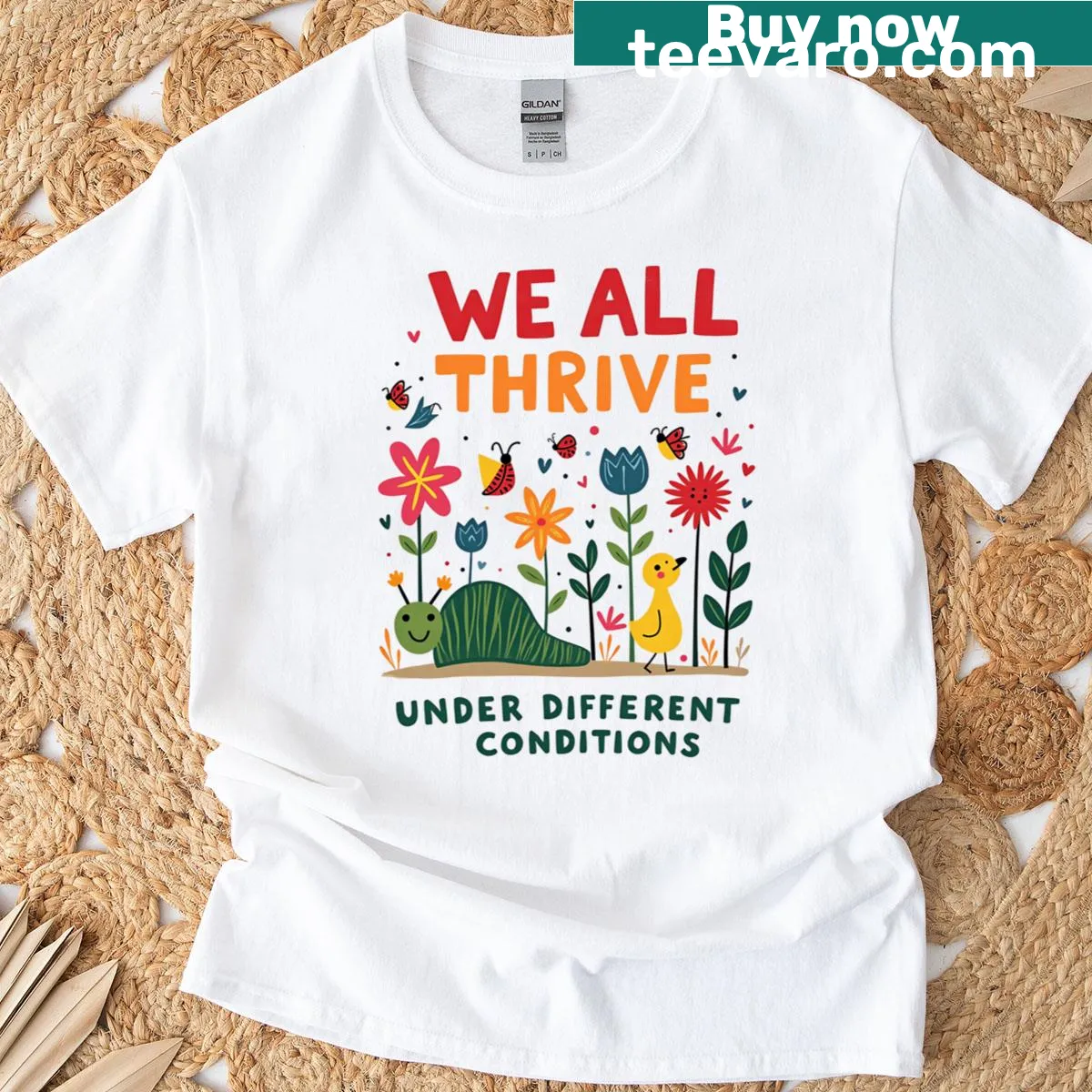 Inspirational T-shirt with text We All Thrive Under Different Conditions — on a men's t-shirt