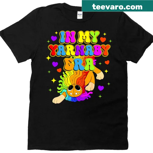Cute cartoon plush critters on a kids' T-shirt with playful text.