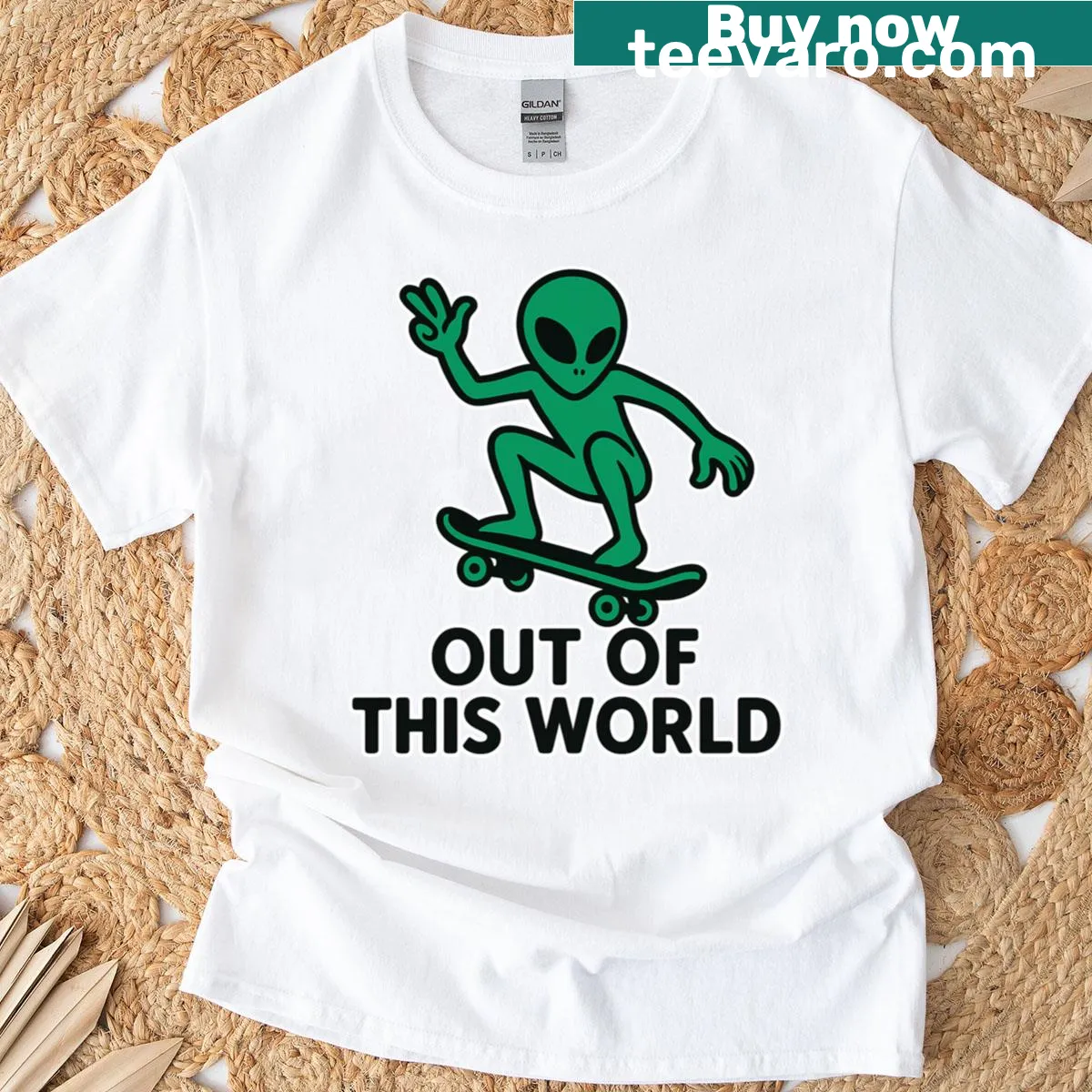 Cartoon alien on skateboard design for a playful t-shirt — on a men's t-shirt